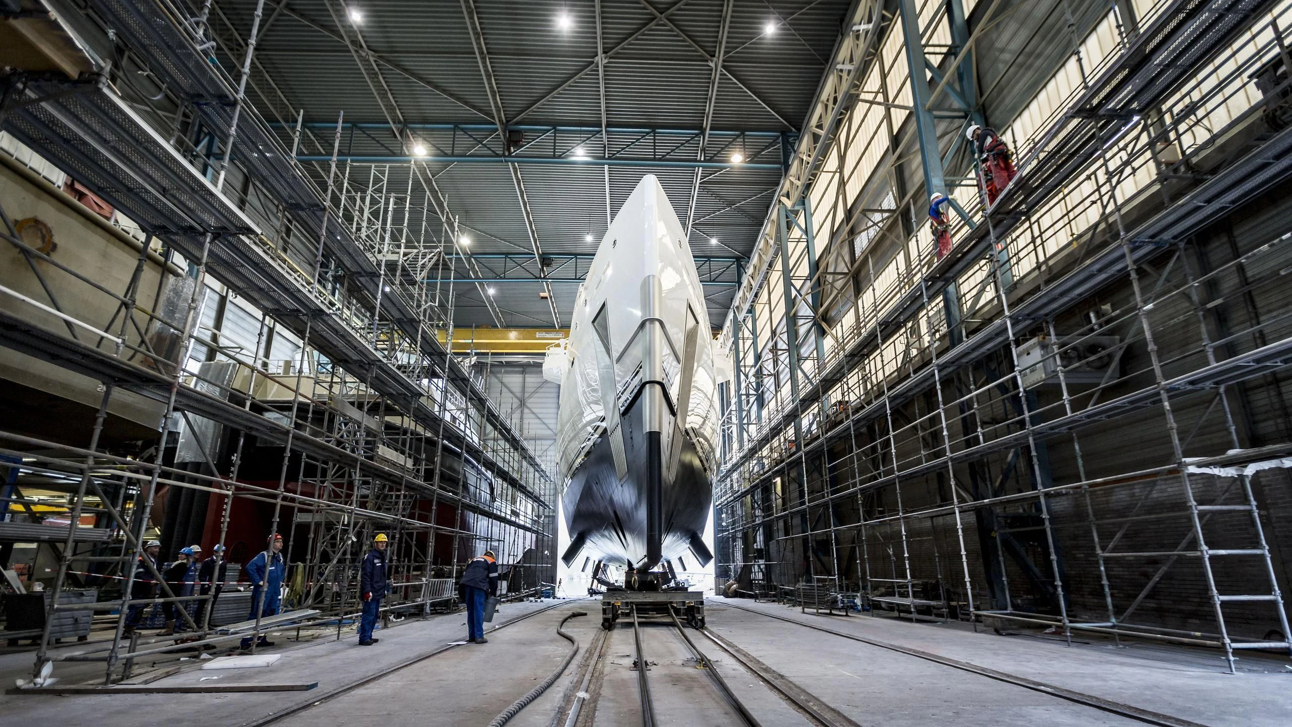 a large metal statue in a warehouse aboard GAME CHANGER Yacht for Sale