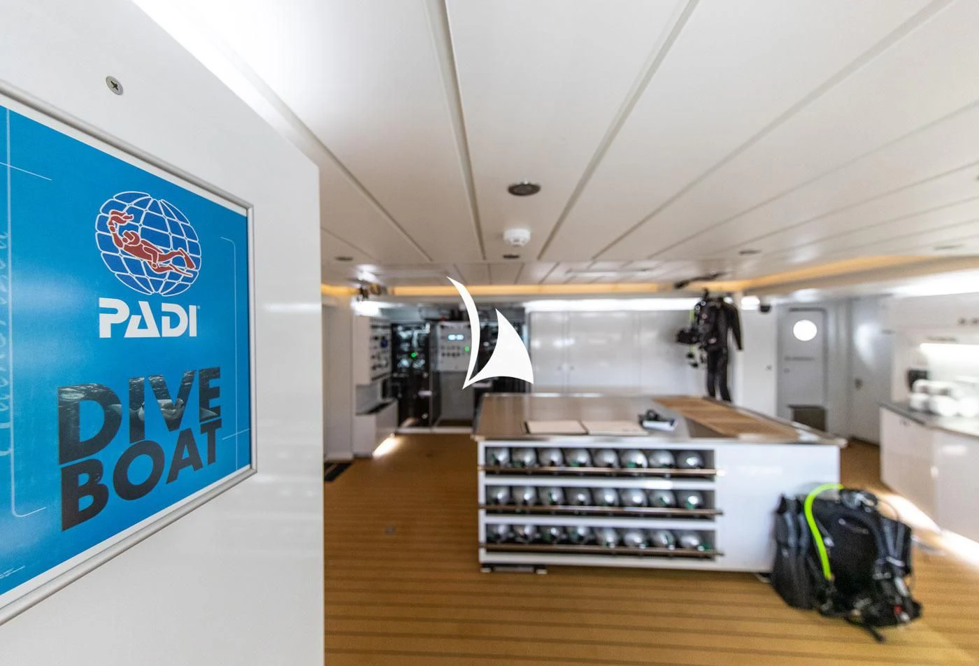 a room with a large display aboard GAME CHANGER Yacht for Sale