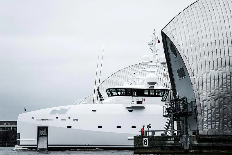 a large white boat docked aboard GAME CHANGER Yacht for Sale