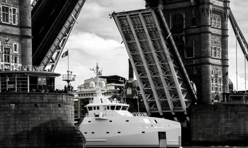 a boat in a canal aboard GAME CHANGER Yacht for Sale