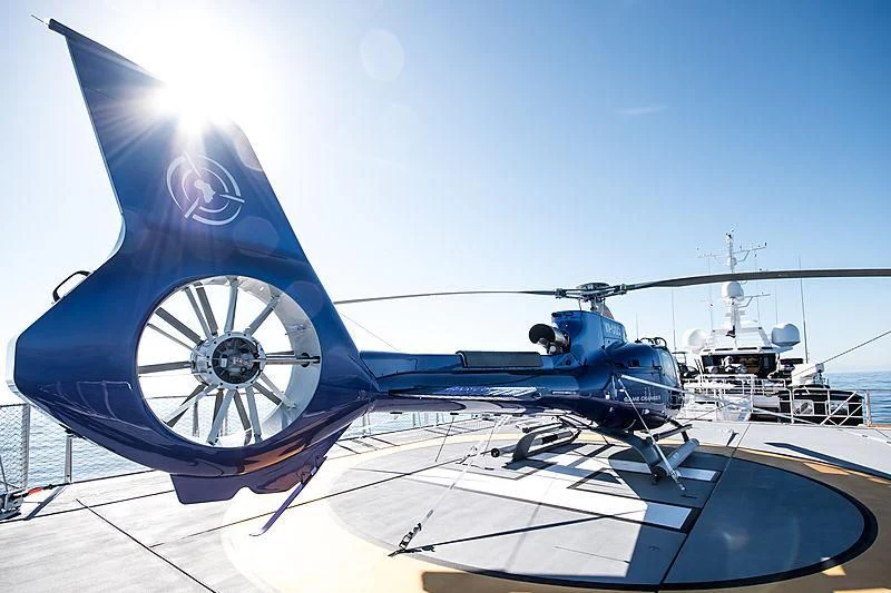 a large blue clock on a white surface aboard GAME CHANGER Yacht for Sale