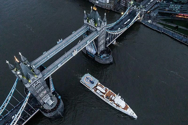 a large ship with a large ship on it aboard GAME CHANGER Yacht for Sale