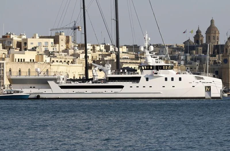 a white boat in the water aboard GAME CHANGER Yacht for Sale