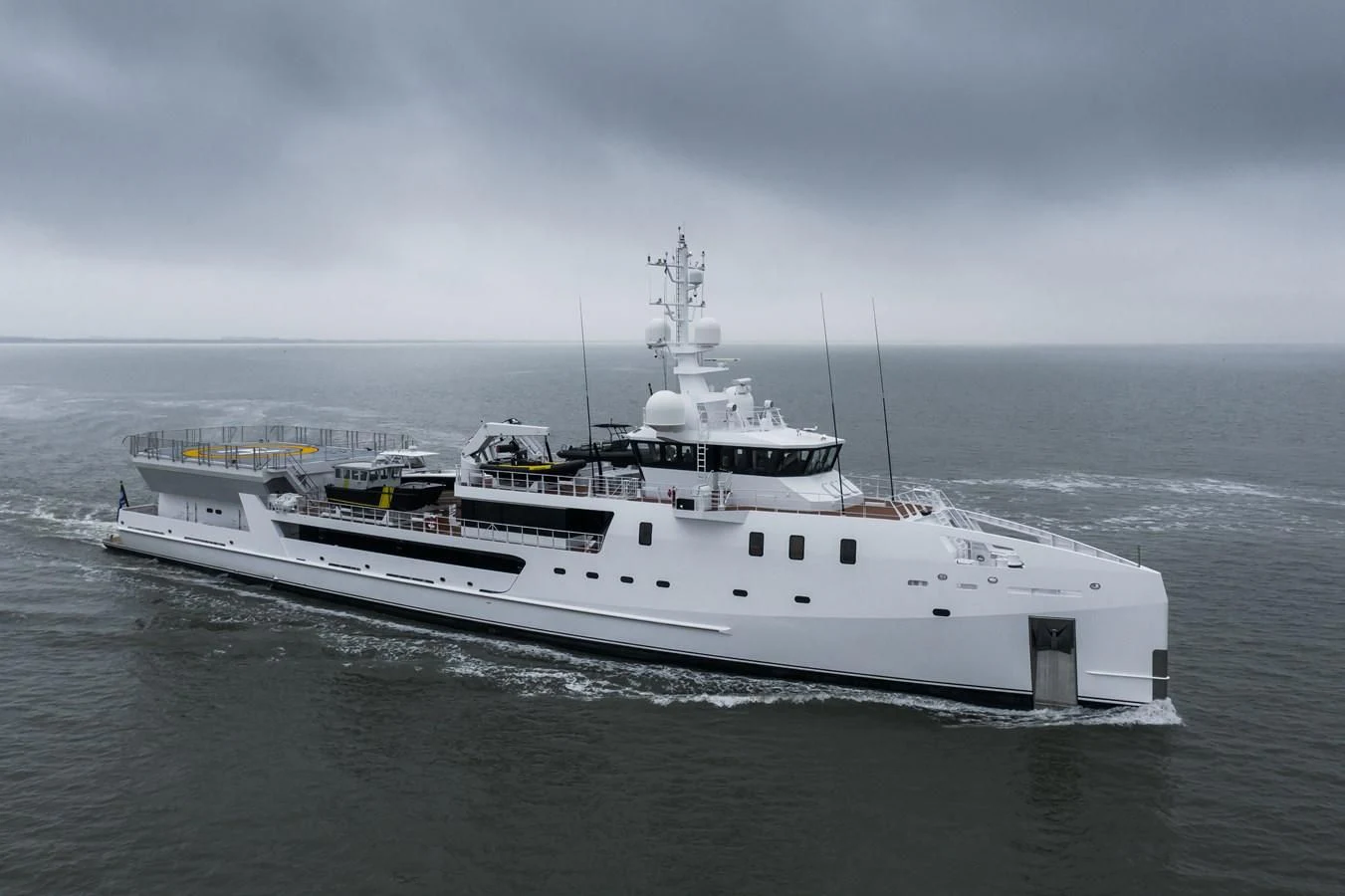 a large white boat in the water aboard GAME CHANGER Yacht for Sale