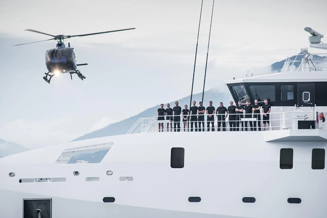 a group of people on a ship aboard GAME CHANGER Yacht for Sale