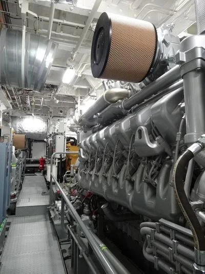 a large metal machine aboard GAME CHANGER Yacht for Sale
