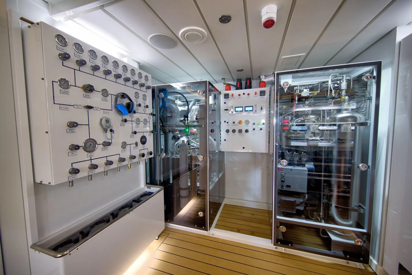 a room with equipment and lights aboard GAME CHANGER Yacht for Sale