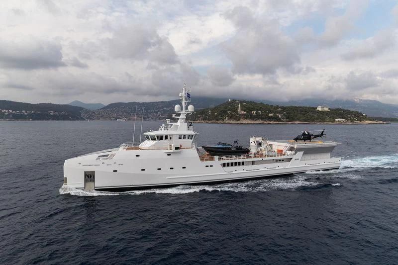 a large white boat in the water aboard GAME CHANGER Yacht for Sale