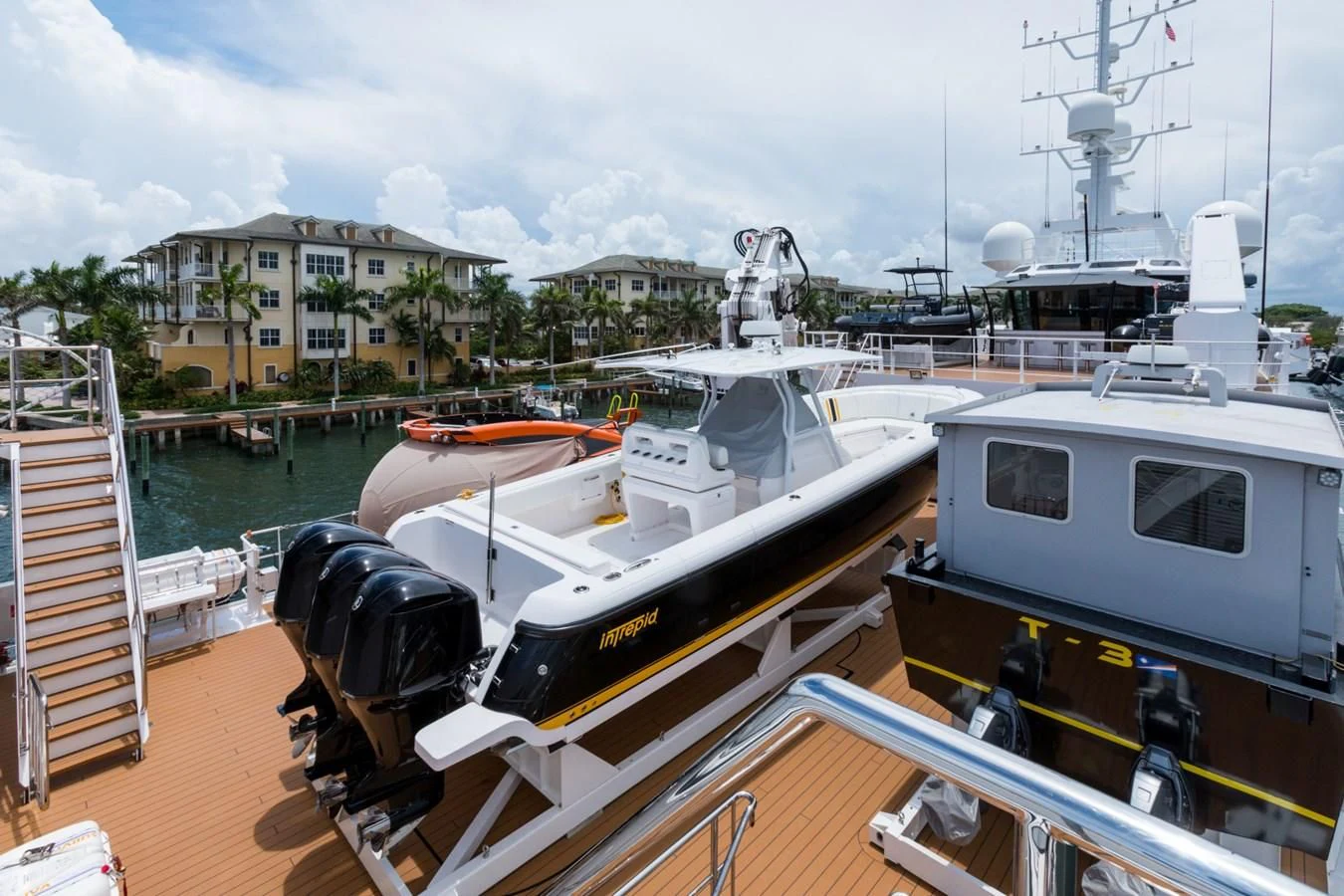 a boat docked at a pier aboard GAME CHANGER Yacht for Sale