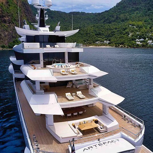 a large boat on a body of water aboard ARTEFACT Yacht for Sale