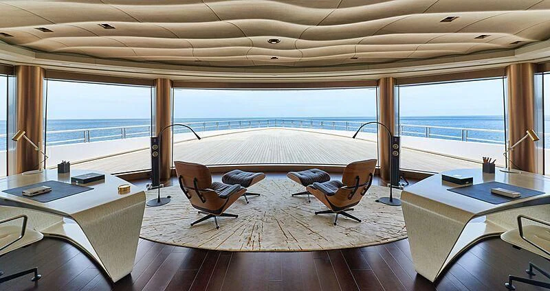 a room with a view of the ocean and the deck aboard ARTEFACT Yacht for Sale