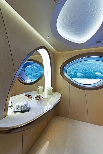 a bathroom with a large mirror aboard ARTEFACT Yacht for Sale