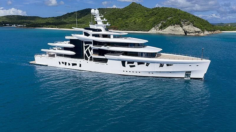 a white yacht in the water aboard ARTEFACT Yacht for Sale