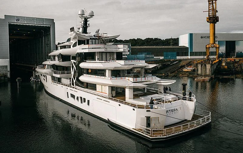 a boat docked at a dock aboard ARTEFACT Yacht for Sale