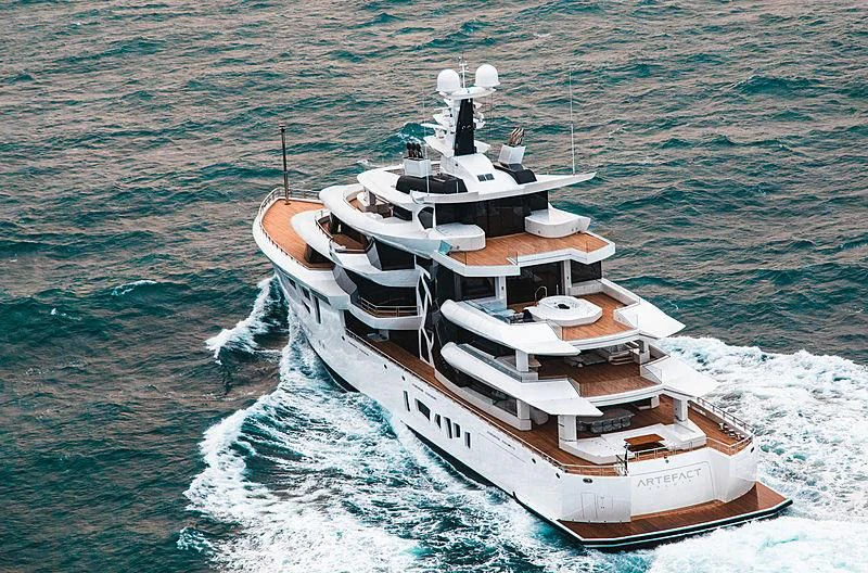 a military ship in the water aboard ARTEFACT Yacht for Sale