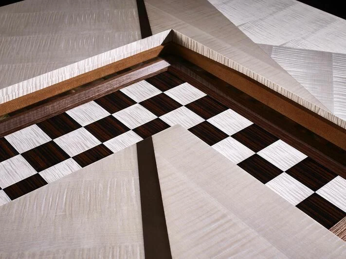 a close-up of a black and white checkered floor aboard ARTEFACT Yacht for Sale