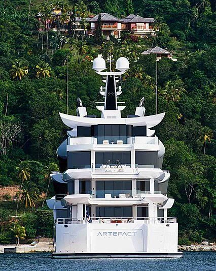 a large white ship in the water aboard ARTEFACT Yacht for Sale