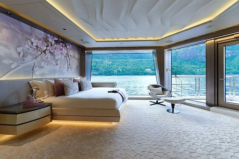 a living room with a large window aboard ARTEFACT Yacht for Sale