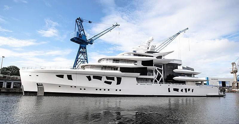 a large white boat with a crane on top of it aboard ARTEFACT Yacht for Sale