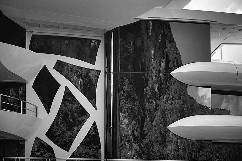 a room with a table and chairs aboard ARTEFACT Yacht for Sale