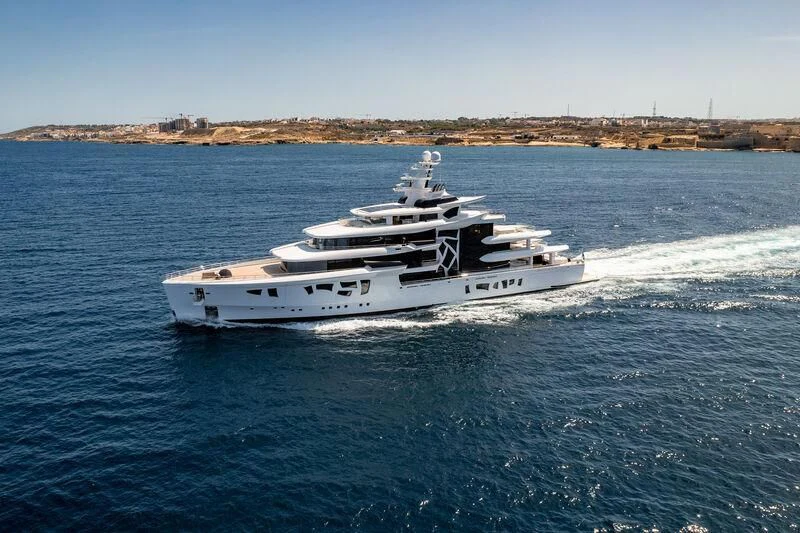 a white yacht on the water aboard ARTEFACT Yacht for Sale