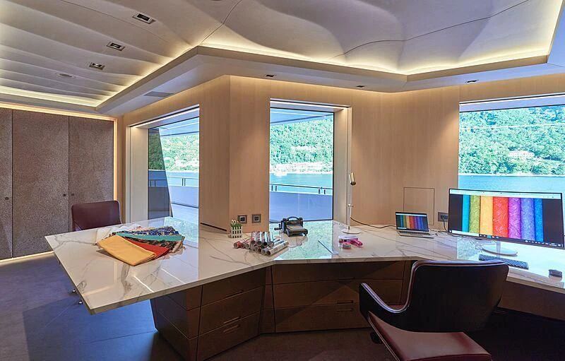 a room with a desk and a computer aboard ARTEFACT Yacht for Sale