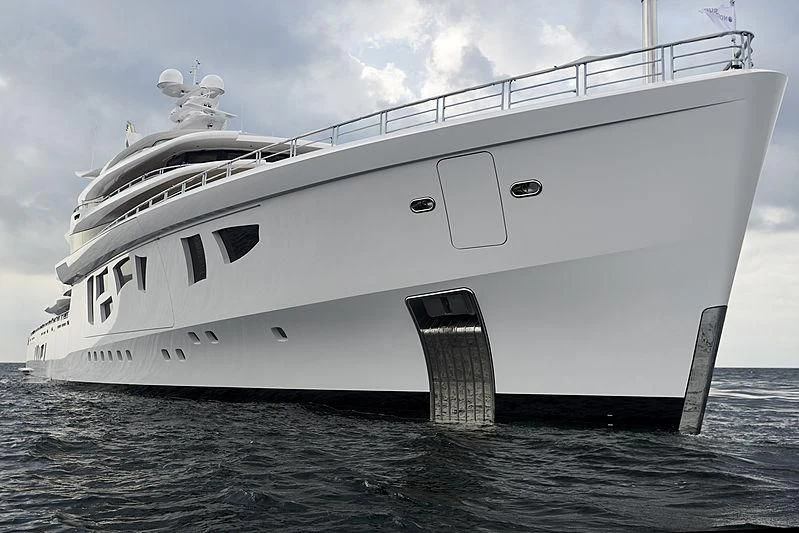 a large white ship in the water aboard ARTEFACT Yacht for Sale