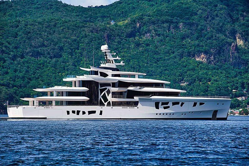 a large white yacht in the water aboard ARTEFACT Yacht for Sale