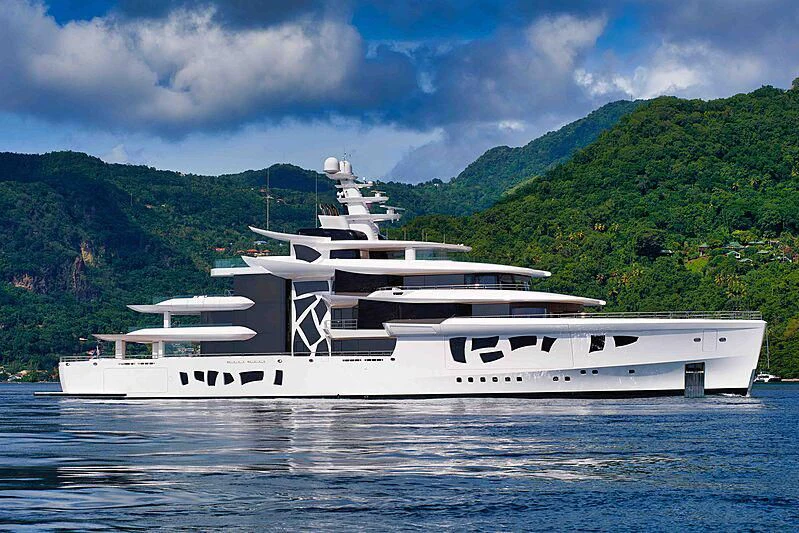a white yacht in the water aboard ARTEFACT Yacht for Sale