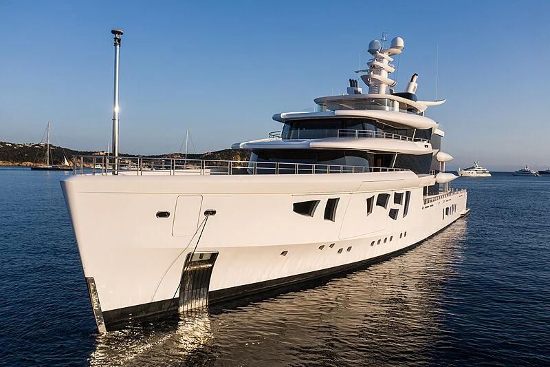 a large white ship in the water aboard ARTEFACT Yacht for Sale