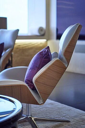 a purple folded napkin on a table aboard ARTEFACT Yacht for Sale