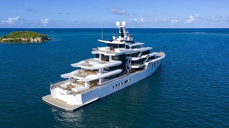 a white boat in the water aboard ARTEFACT Yacht for Sale