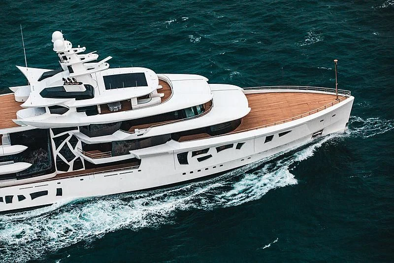 a white yacht on the water aboard ARTEFACT Yacht for Sale