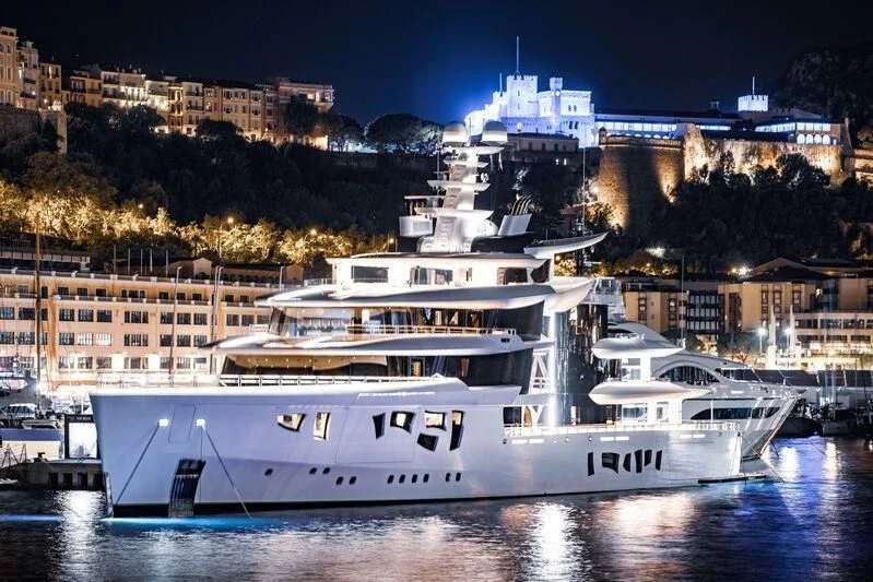 a large white ship in the water aboard ARTEFACT Yacht for Sale