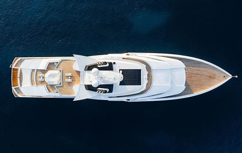 a white and gold boat aboard ARTEFACT Yacht for Sale