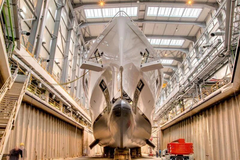 a large white cow in a large building aboard ARTEFACT Yacht for Sale