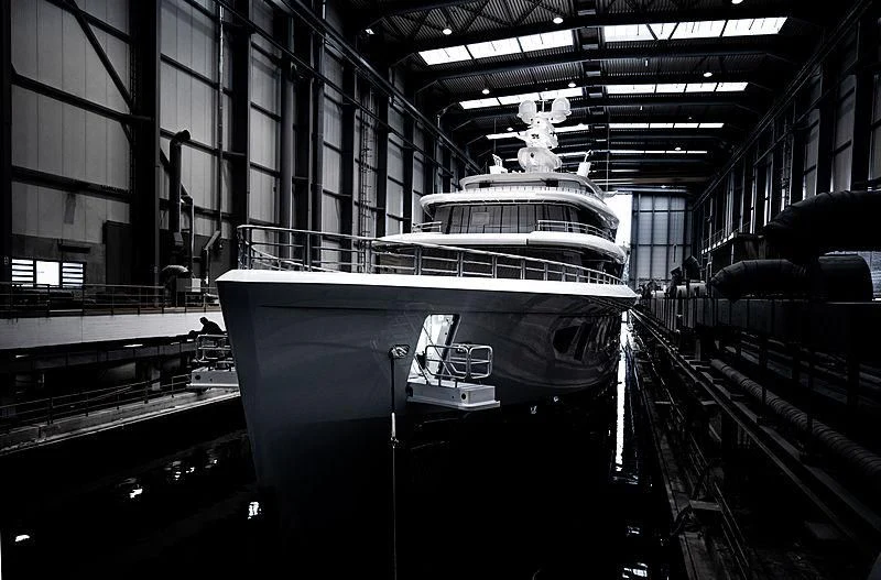 a large white boat in a building aboard ARTEFACT Yacht for Sale