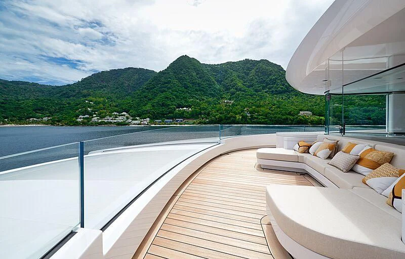 a room with a view of a mountain and a body of water aboard ARTEFACT Yacht for Sale