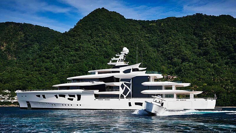 a white yacht in the water aboard ARTEFACT Yacht for Sale