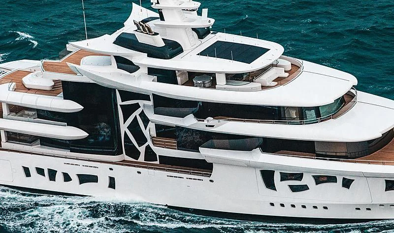 a white boat on the water aboard ARTEFACT Yacht for Sale