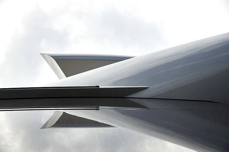 a wing of an airplane aboard ARTEFACT Yacht for Sale