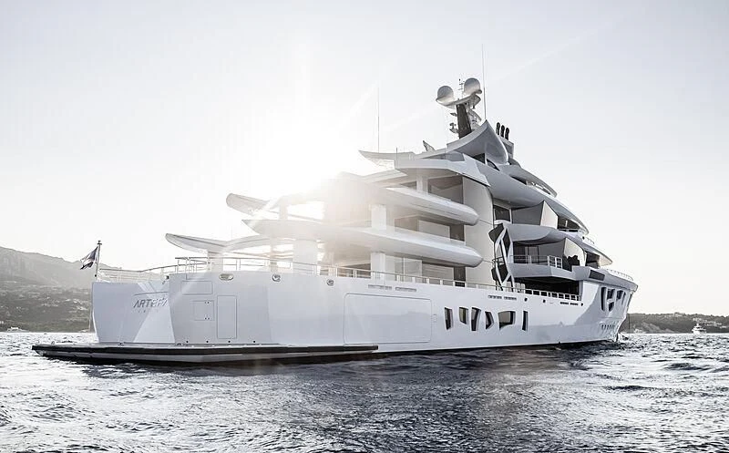 a large white boat in the water aboard ARTEFACT Yacht for Sale