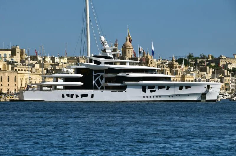 a white boat in the water aboard ARTEFACT Yacht for Sale