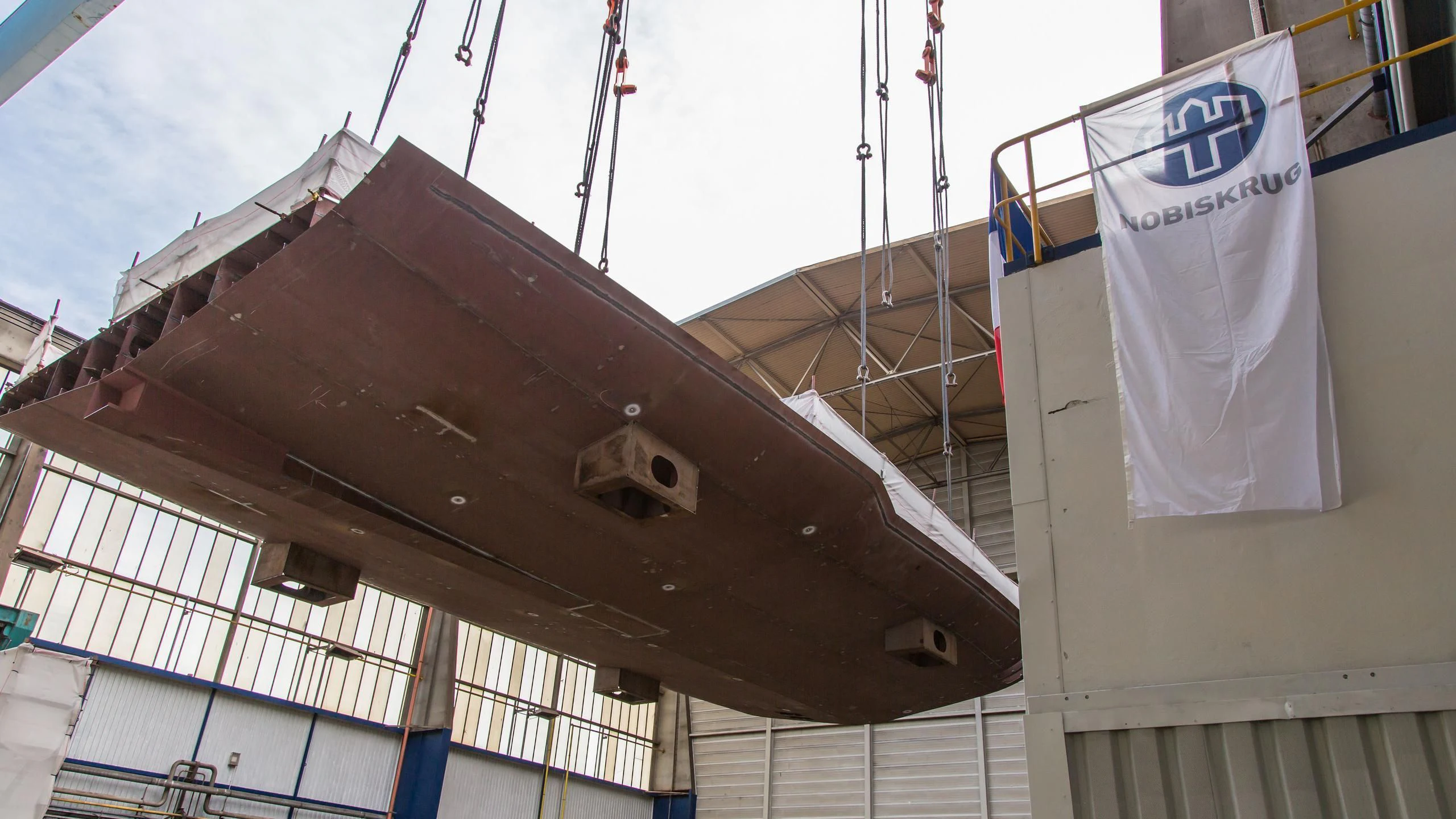 a large boat with a satellite dish on the side aboard ARTEFACT Yacht for Sale