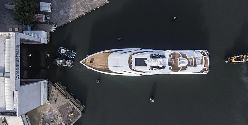 a car parked on the side of a road aboard ARTEFACT Yacht for Sale