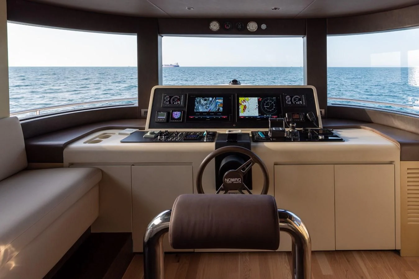 a room with a large window and a desk with a computer on it aboard RODINIA 2 Yacht for Sale