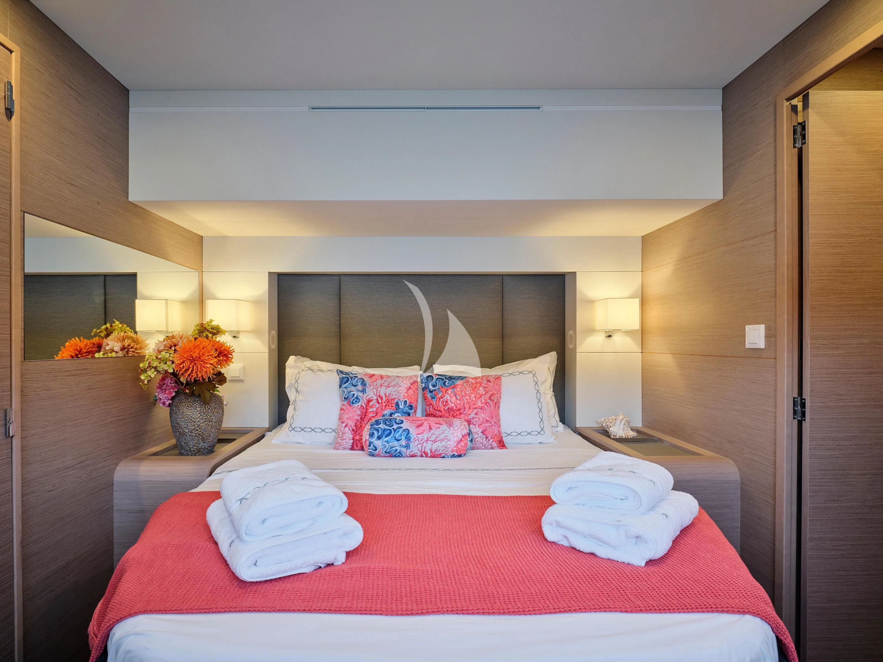 a bed with pillows and pillows aboard KIMATA Yacht for Charter