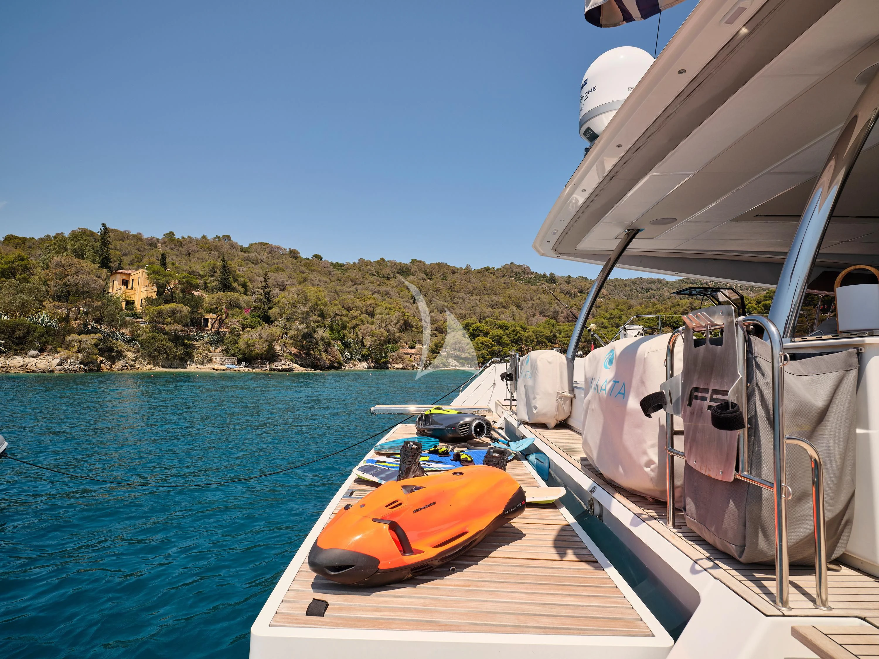 a boat with a motor attached to it aboard KIMATA Yacht for Charter