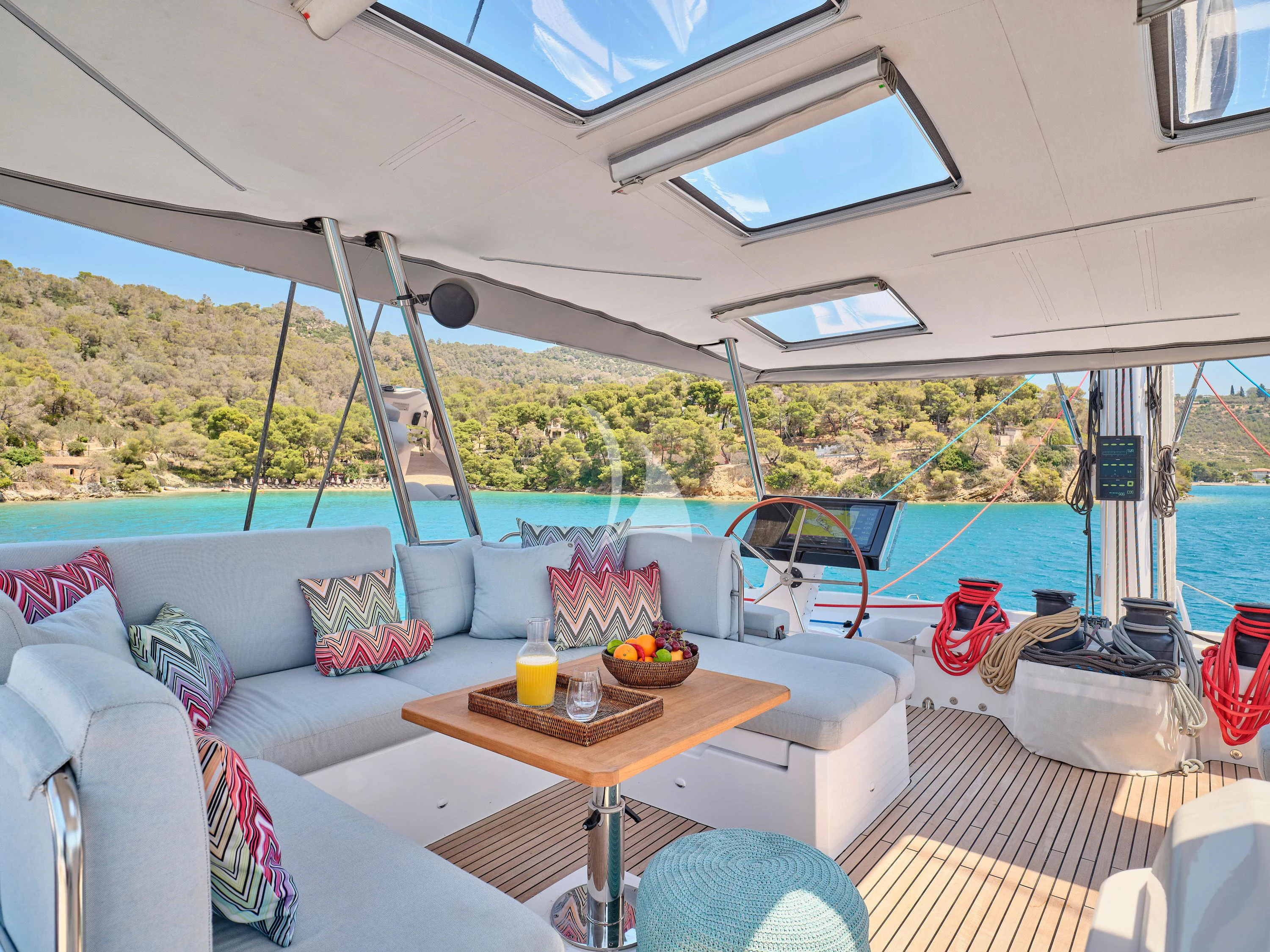 a living room with a pool aboard KIMATA Yacht for Charter
