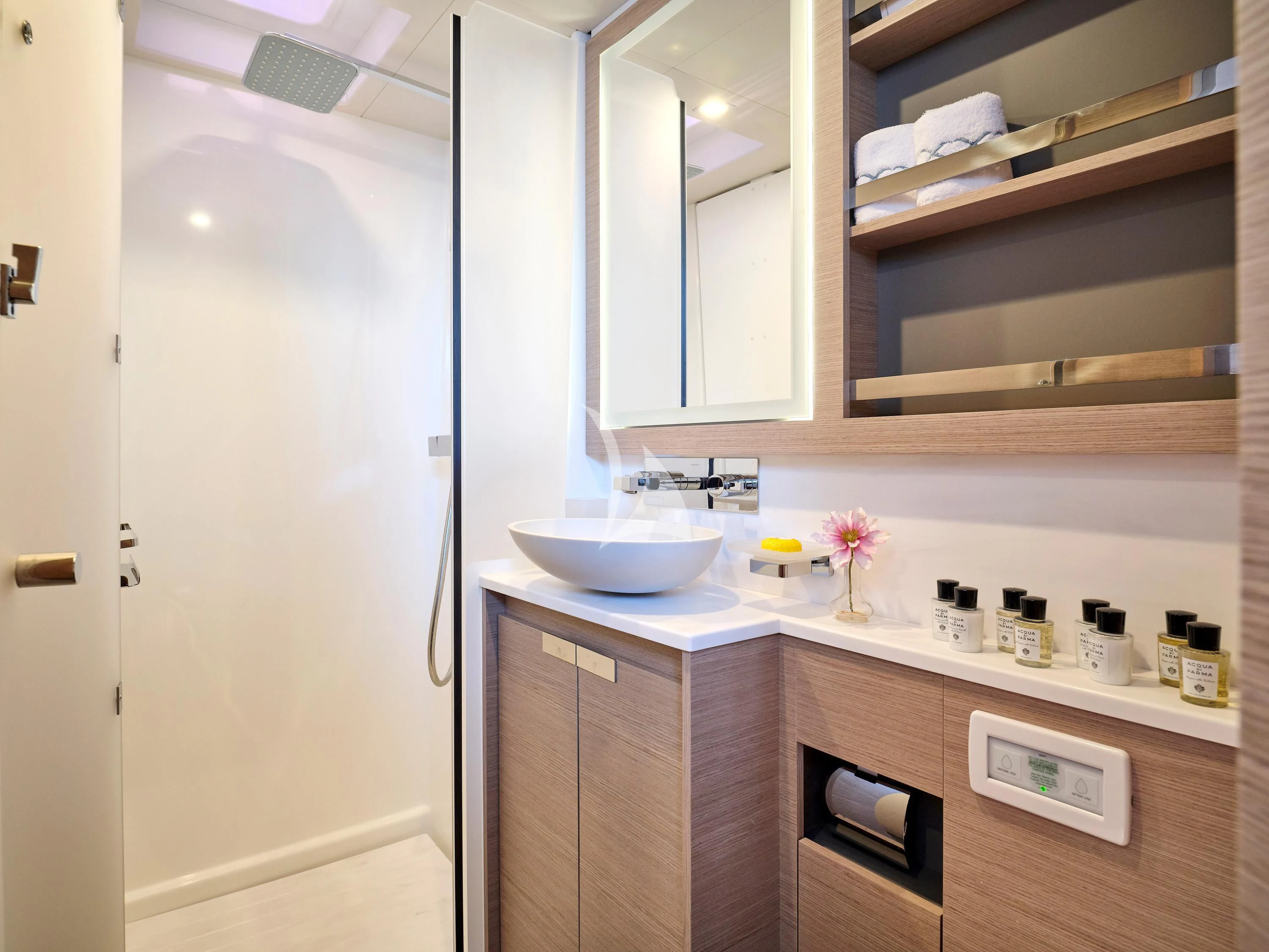 a bathroom with a sink and cabinets aboard KIMATA Yacht for Charter